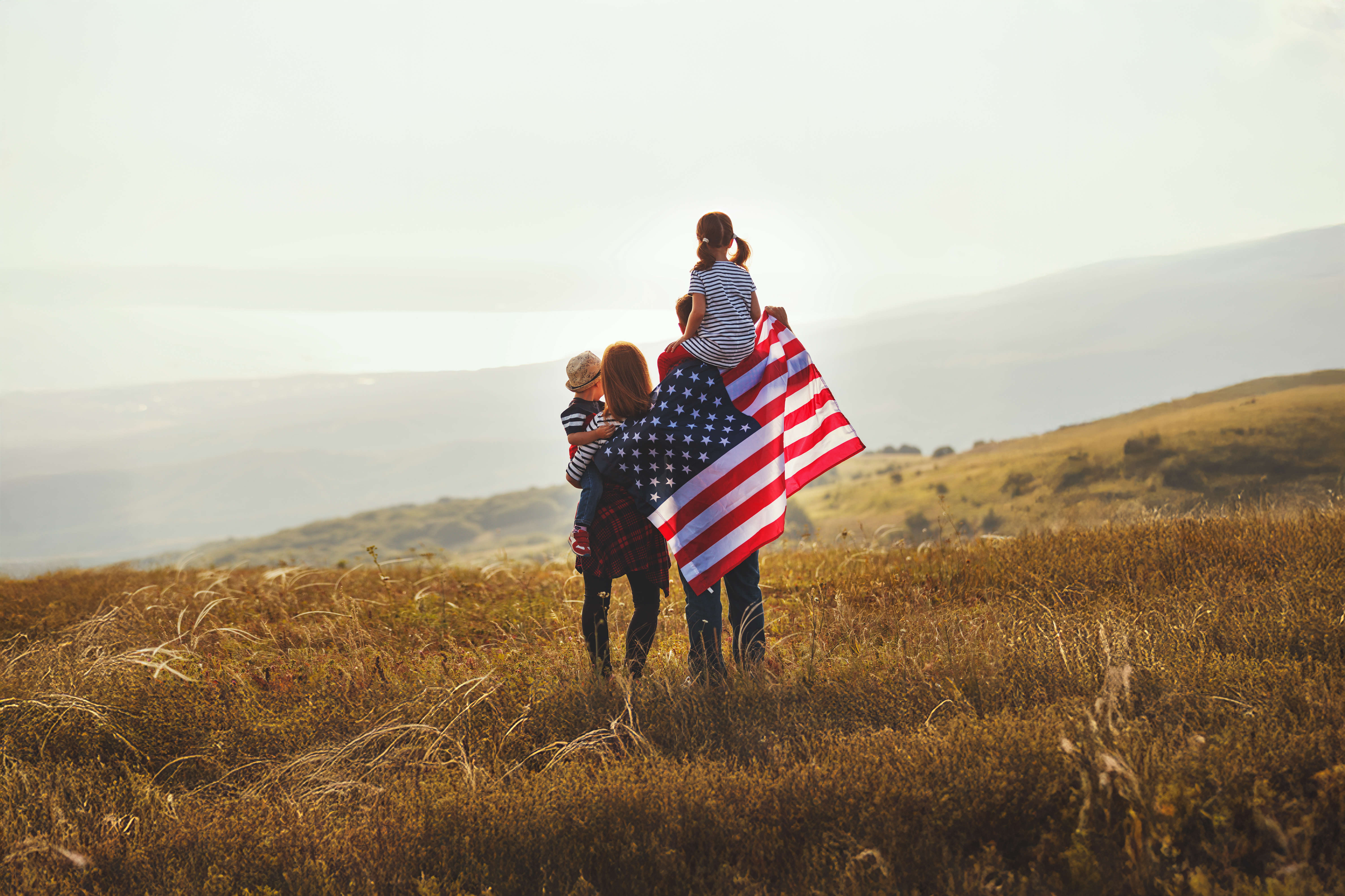 Family with Flag on hill